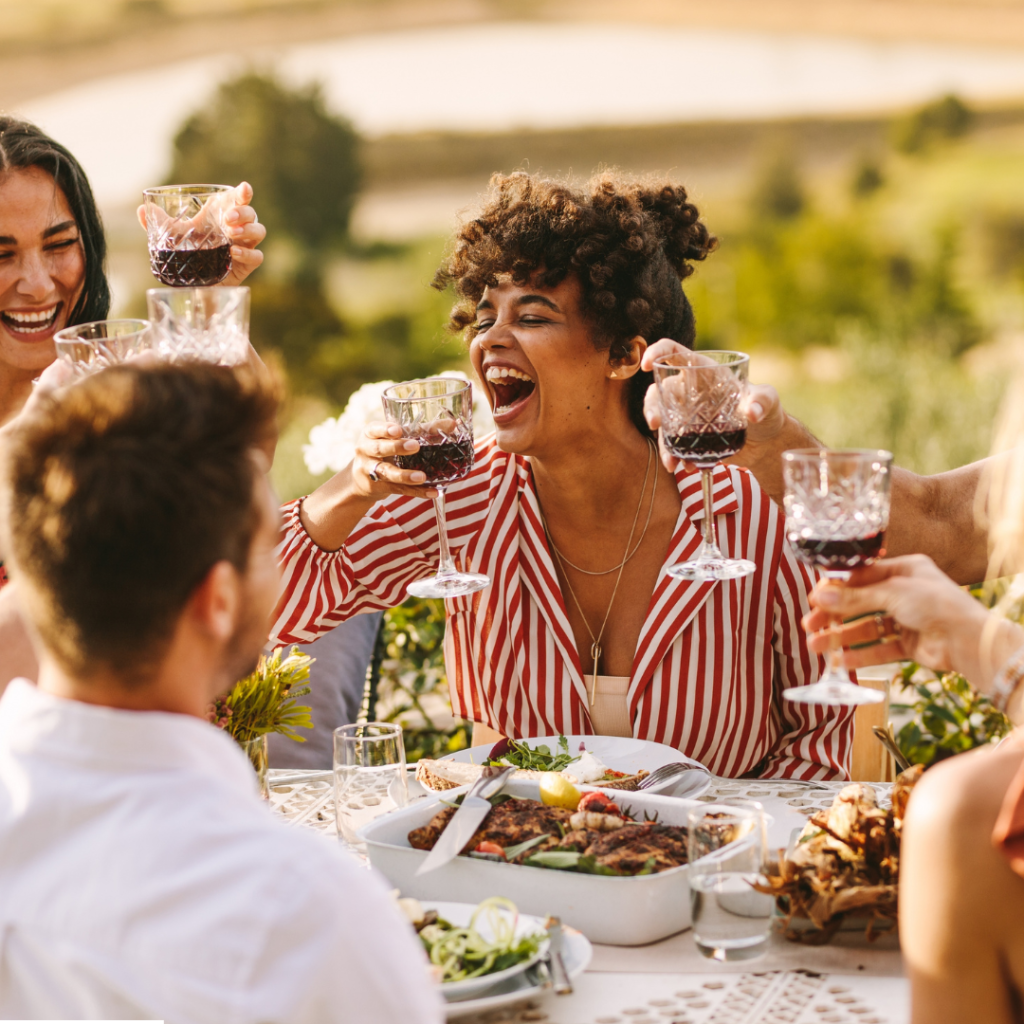 cheers with red wine and smiles