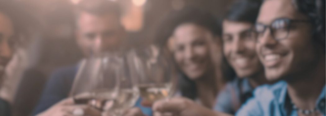 Group of friends clinking glasses